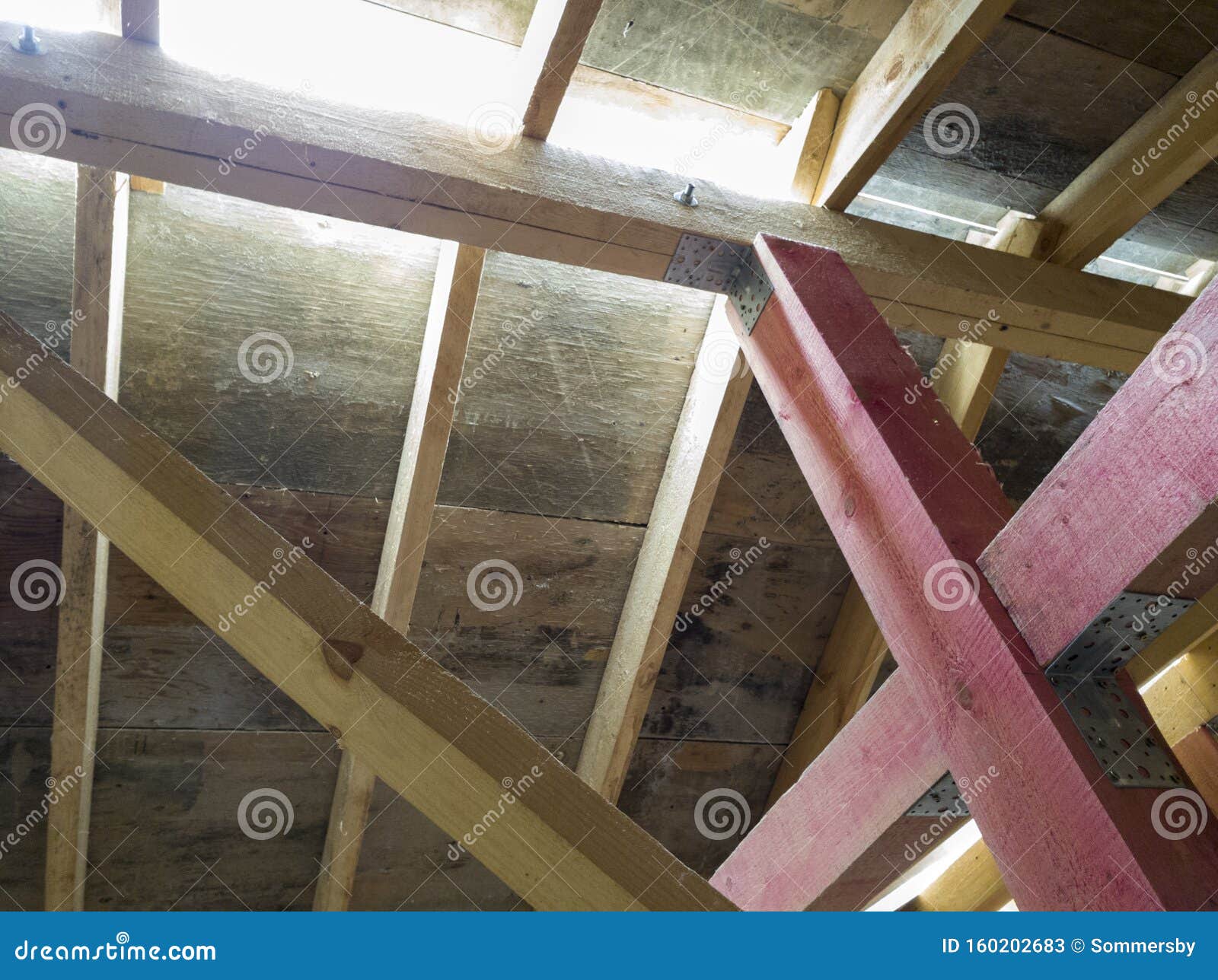 View Of Wooden Rafters When Installing Roof On Construction