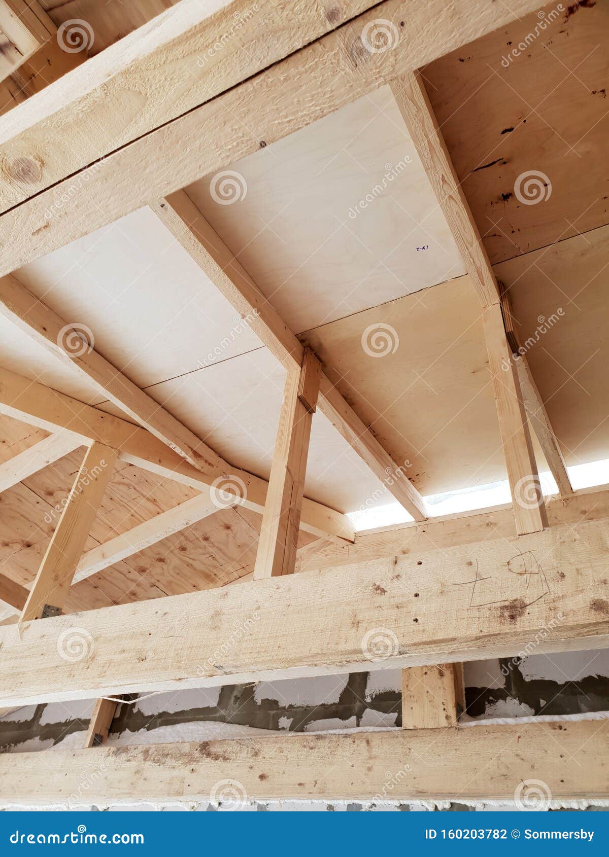 View Of Wooden Rafters When Installing Roof On Construction Of