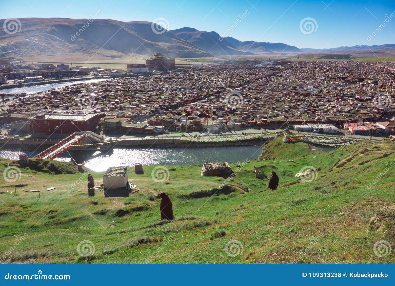 view of the yarchen gar monastery with many shacks for monks in