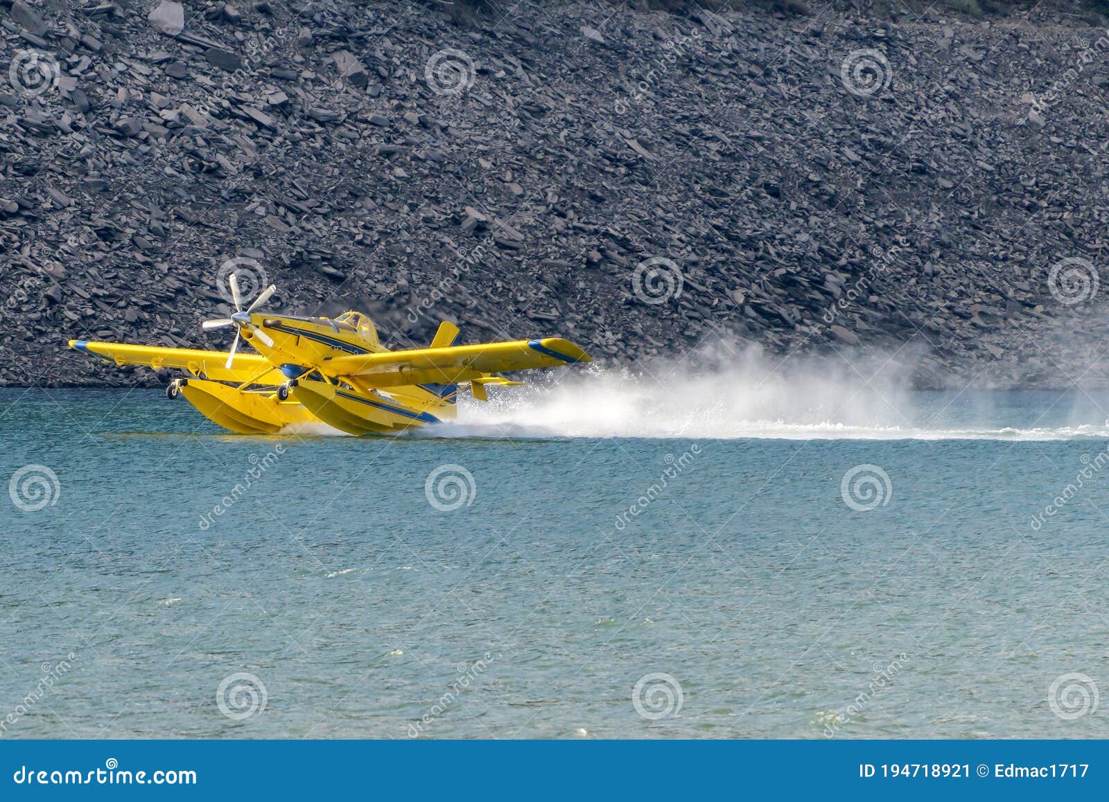 View of Fire Fighting Float Plane Loading Water. Editorial Photo