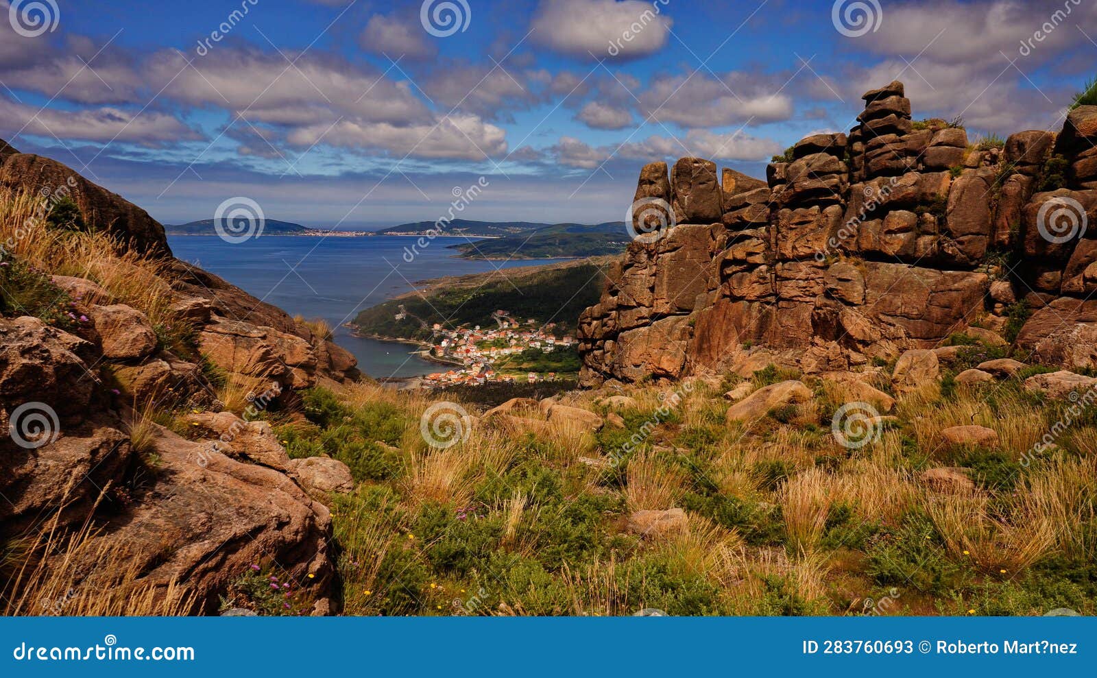 views of the coast of a coruÃ±a (spain) and the atlantic ocean from the top of a hill