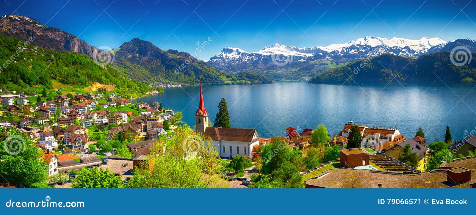 village weggis and lake lucerne surrounded by swiss alps