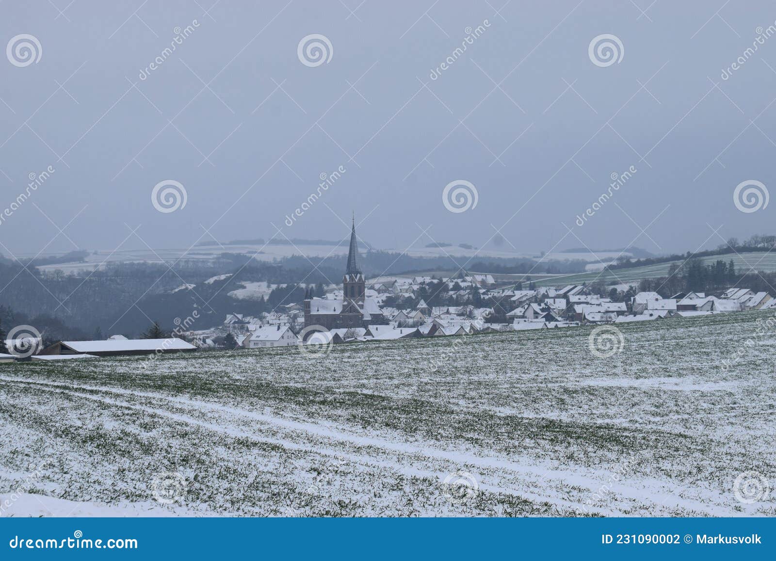 village welling during winter snow
