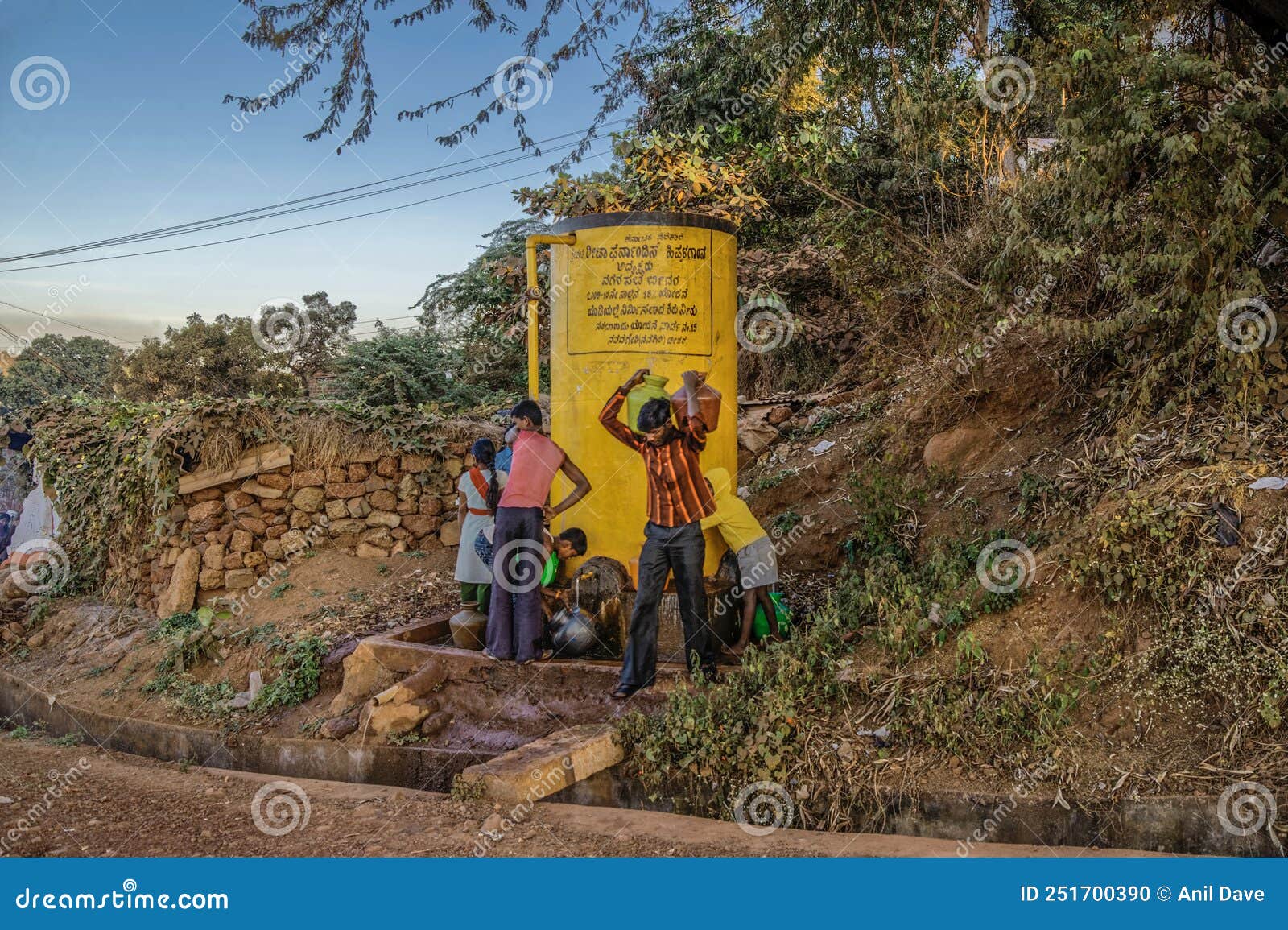 Villagers Collecting Water from Community Government Water Storage