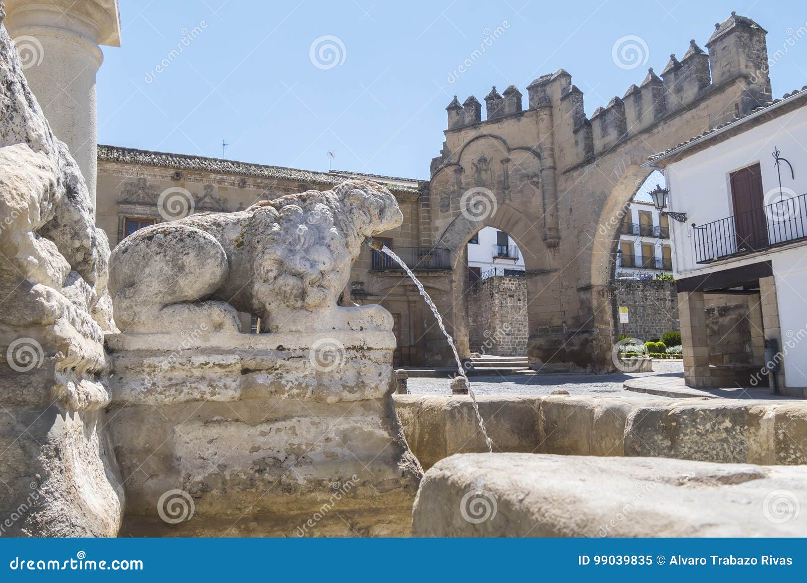 villalar arc,jaen gate and lions fountain, populo square, baeza, jaen, spain