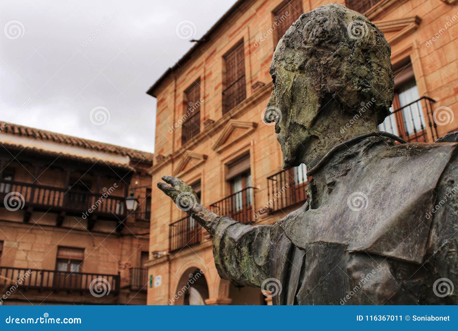 villanueva de los infantes square and don quixote statue in the foreground