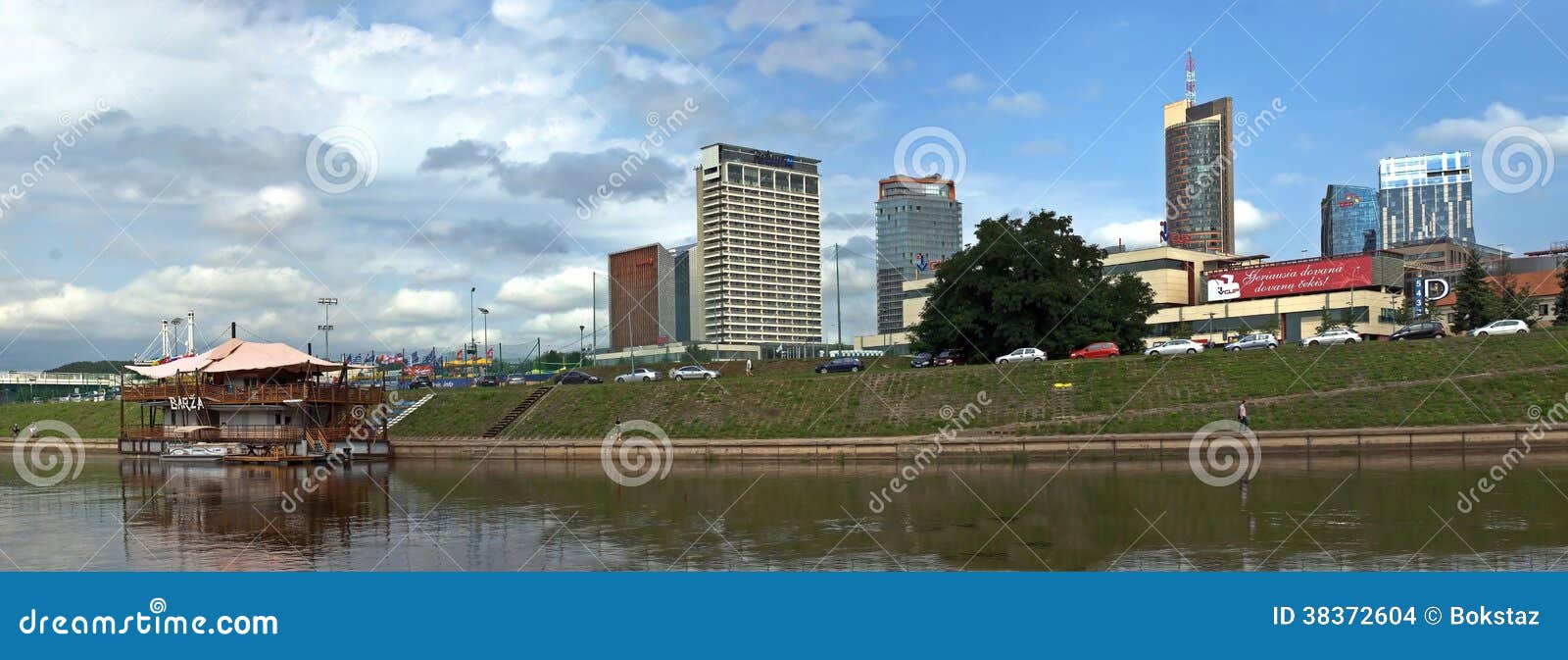 VILNIUS, LITHUANIA, AUGUST 10: The Vilnius city walking bridge with skyscrapers on August 10, 2013 in Vilnius, Lithuania.