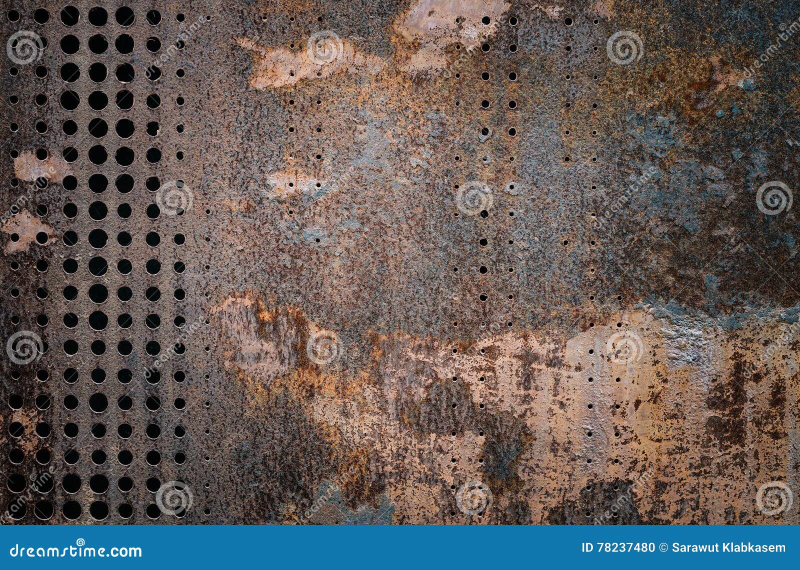 the vintag rusty grunge steel decorated by drilling a wall textured background.