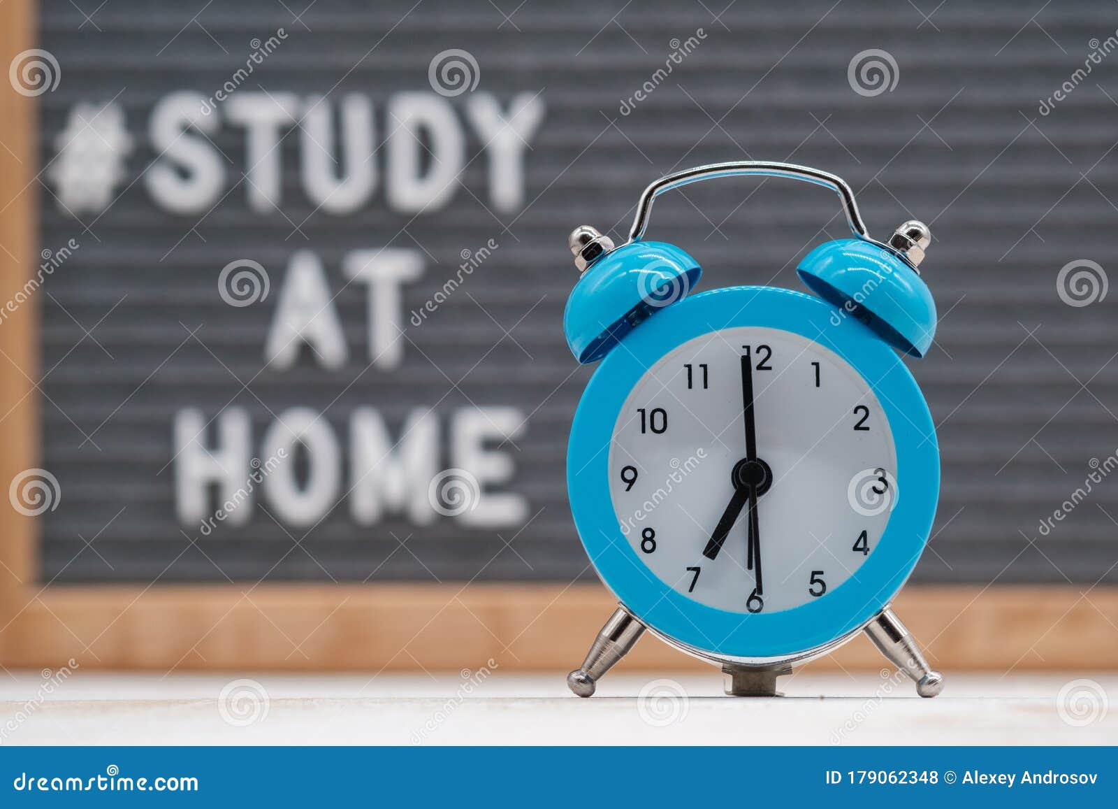 Text In English Spelling `Need Coffee` With Smiley Face Emojis On Black