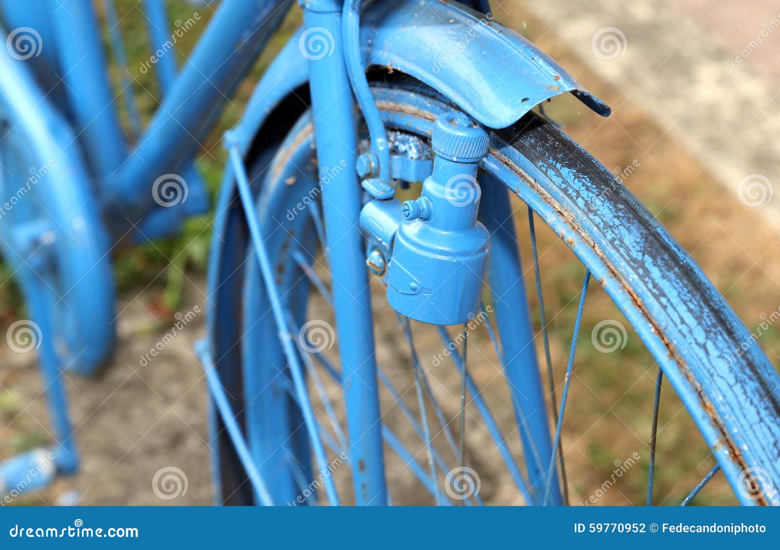 Vintage Bicycle with the Bottle Dynamo on the Front Wheel Stock Photo