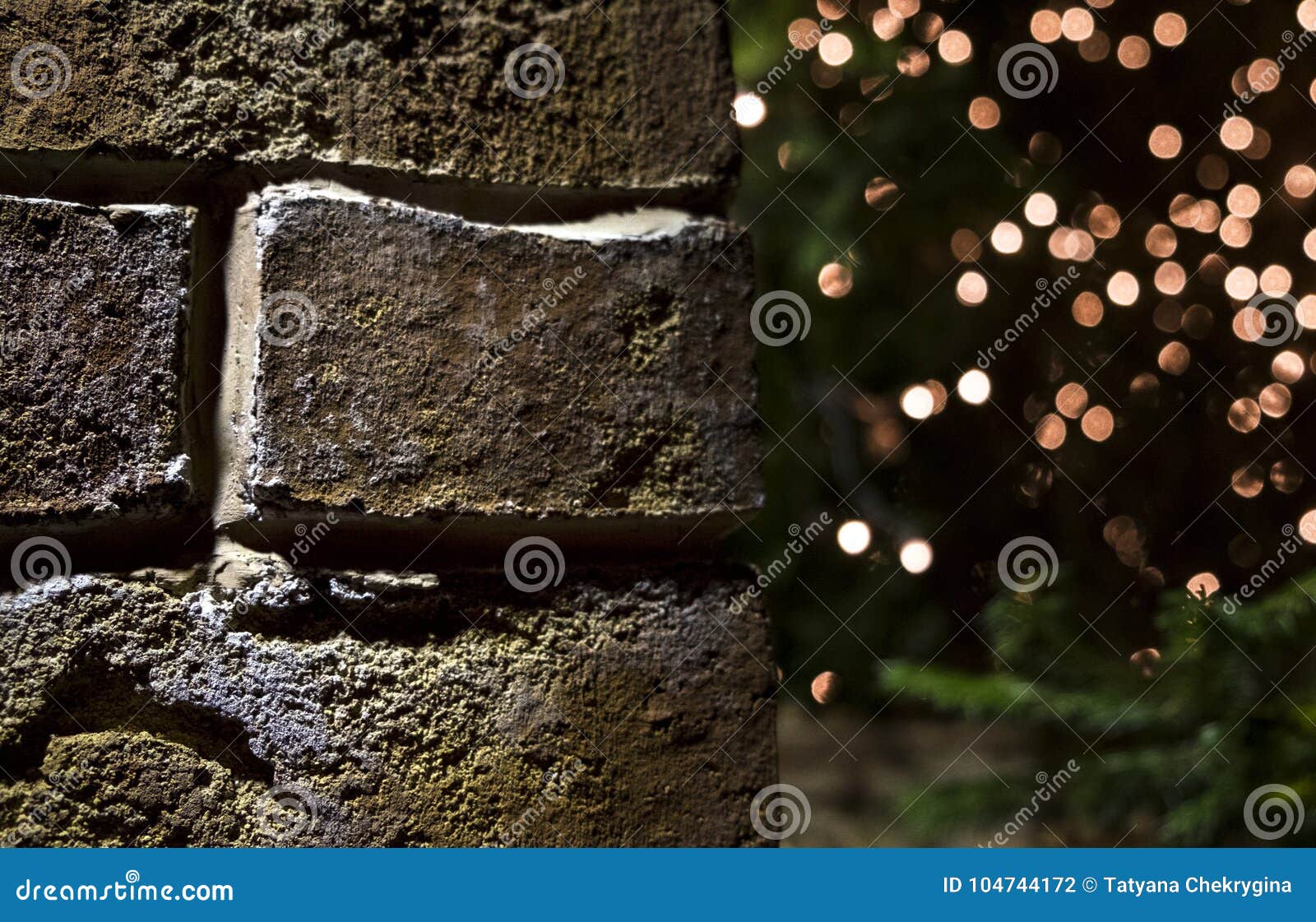 Brick Wall Christmas Background with Lights Glowing Stock Photo Image
