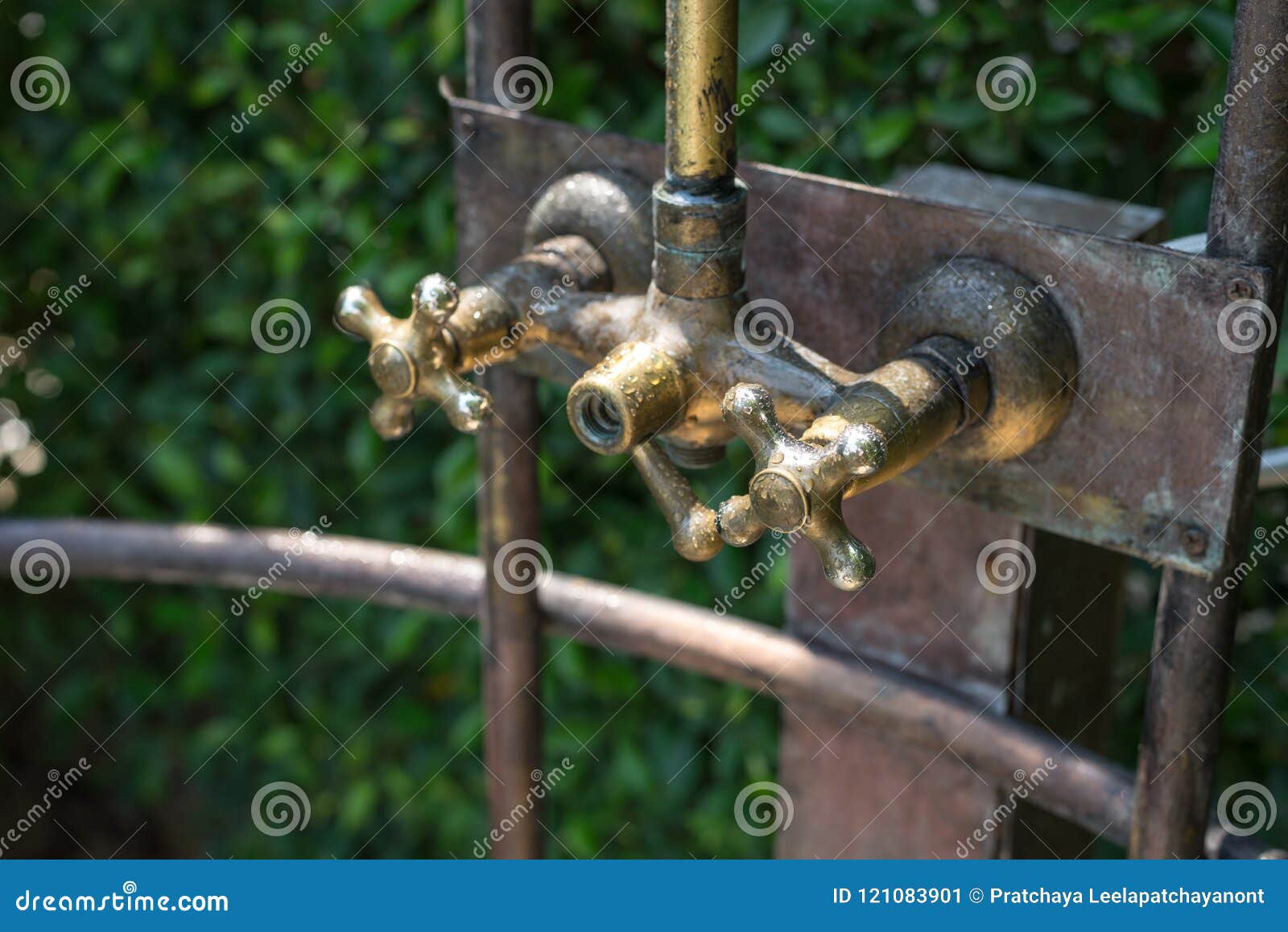 Vintage Bronze Shower Faucet Of Hot And Cold Water Stock Image