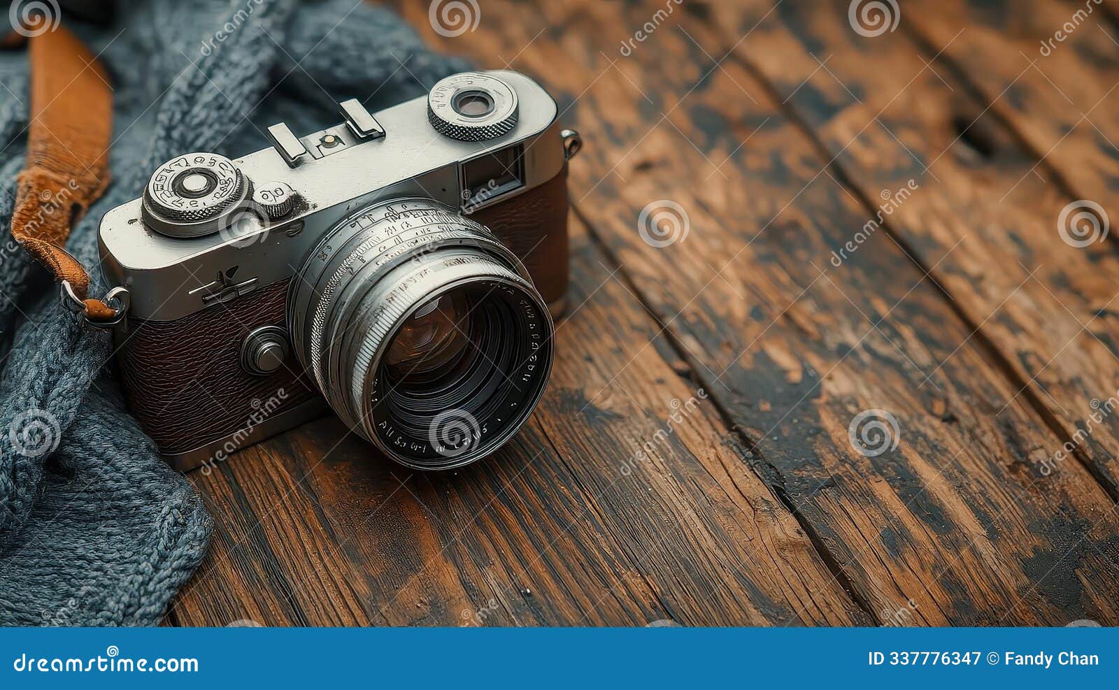 vintage camera on rustic wooden surface capturing memories with a classic