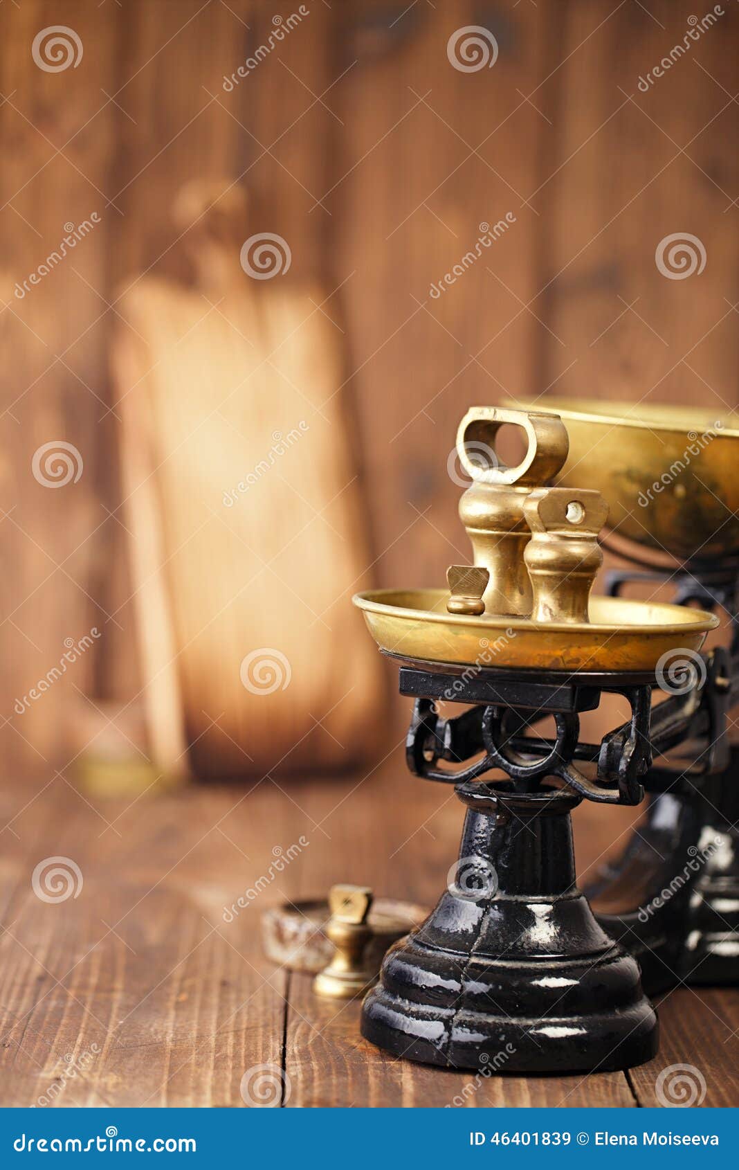 Vintage Cast Iron Kitchen Scale With Weights On Wood Stock Image