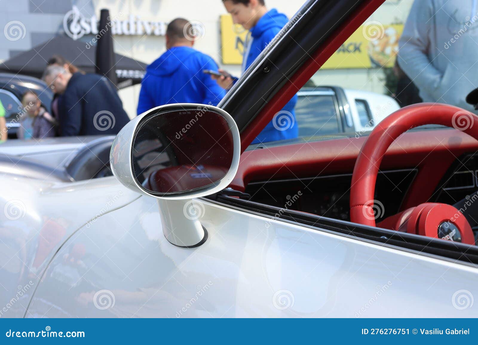 Vintage Chevrolet Corvette white car the mirror