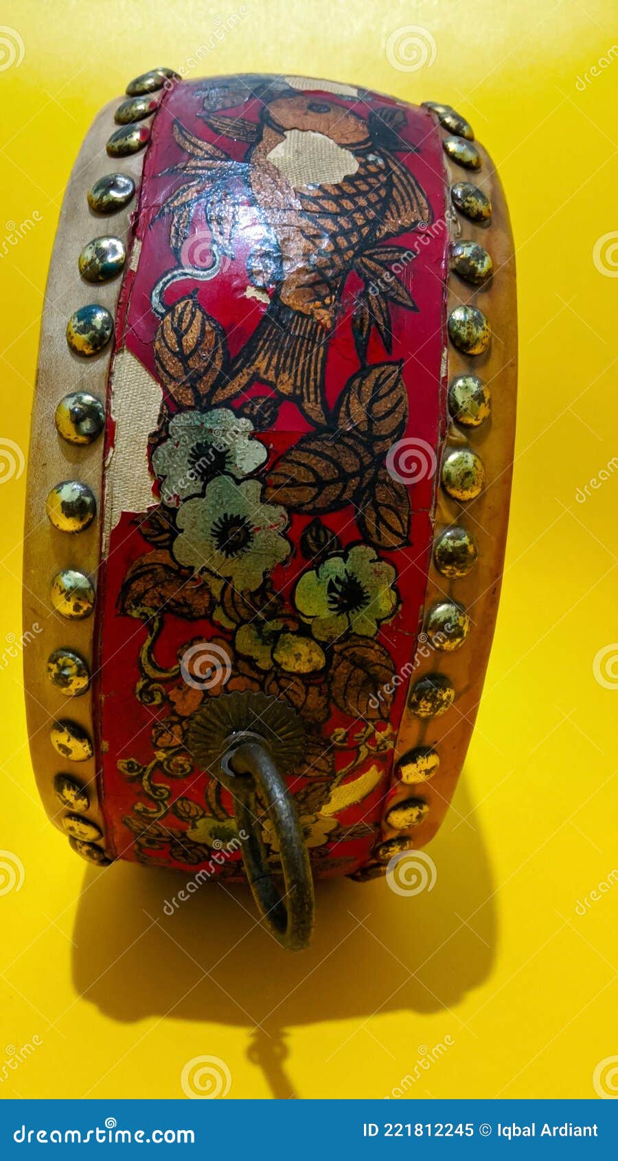 Vintage Classical Drum with a Floral Pattern that Has Started To Rust