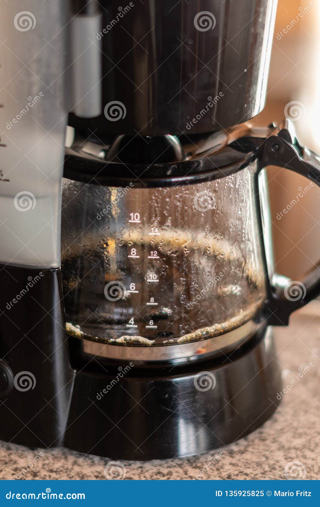 A Vintage Coffee Filter Machine Sanding an a Retro Kitchen. with a Cup