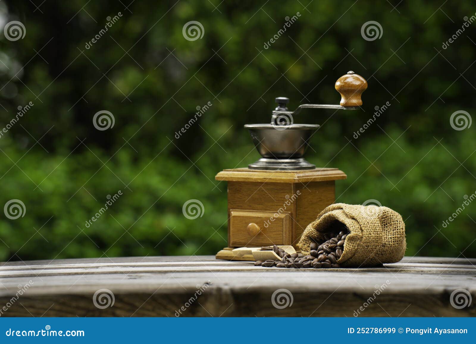 Vintage coffee grinder, Old retro hand-operated wooden and metal