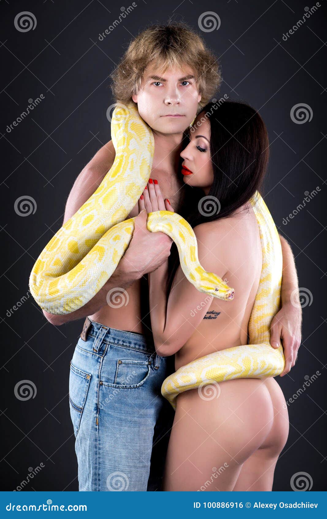 Man woman snake stock photo. Image of interpersonal - 100886916