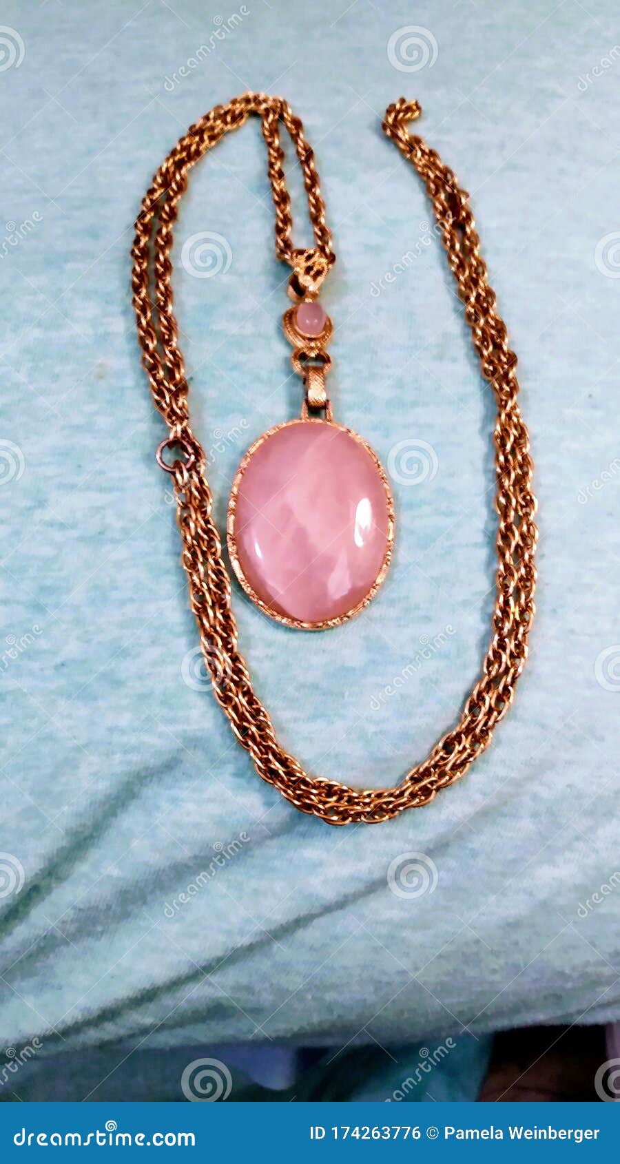 Vintage polished Rose Quartz necklace with pendant.
