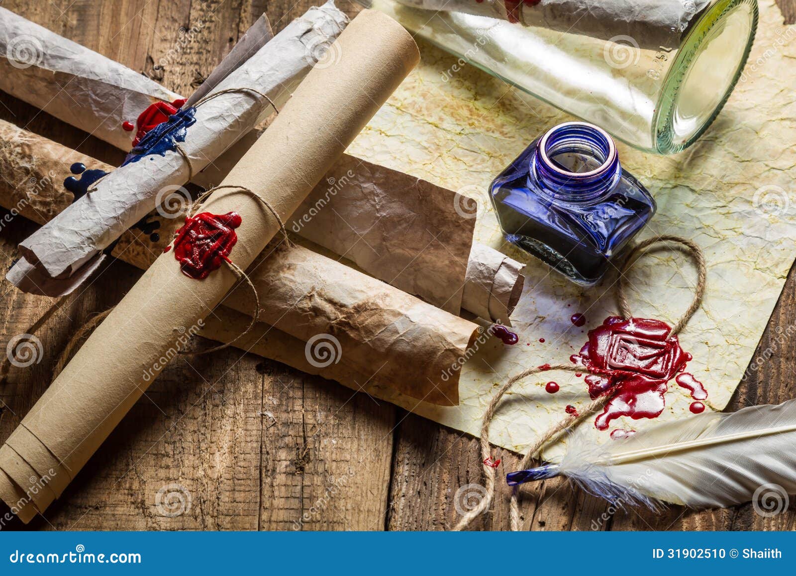 Vintage Desk Full Of Old Scrolls Scribe And Blue Ink Stock 