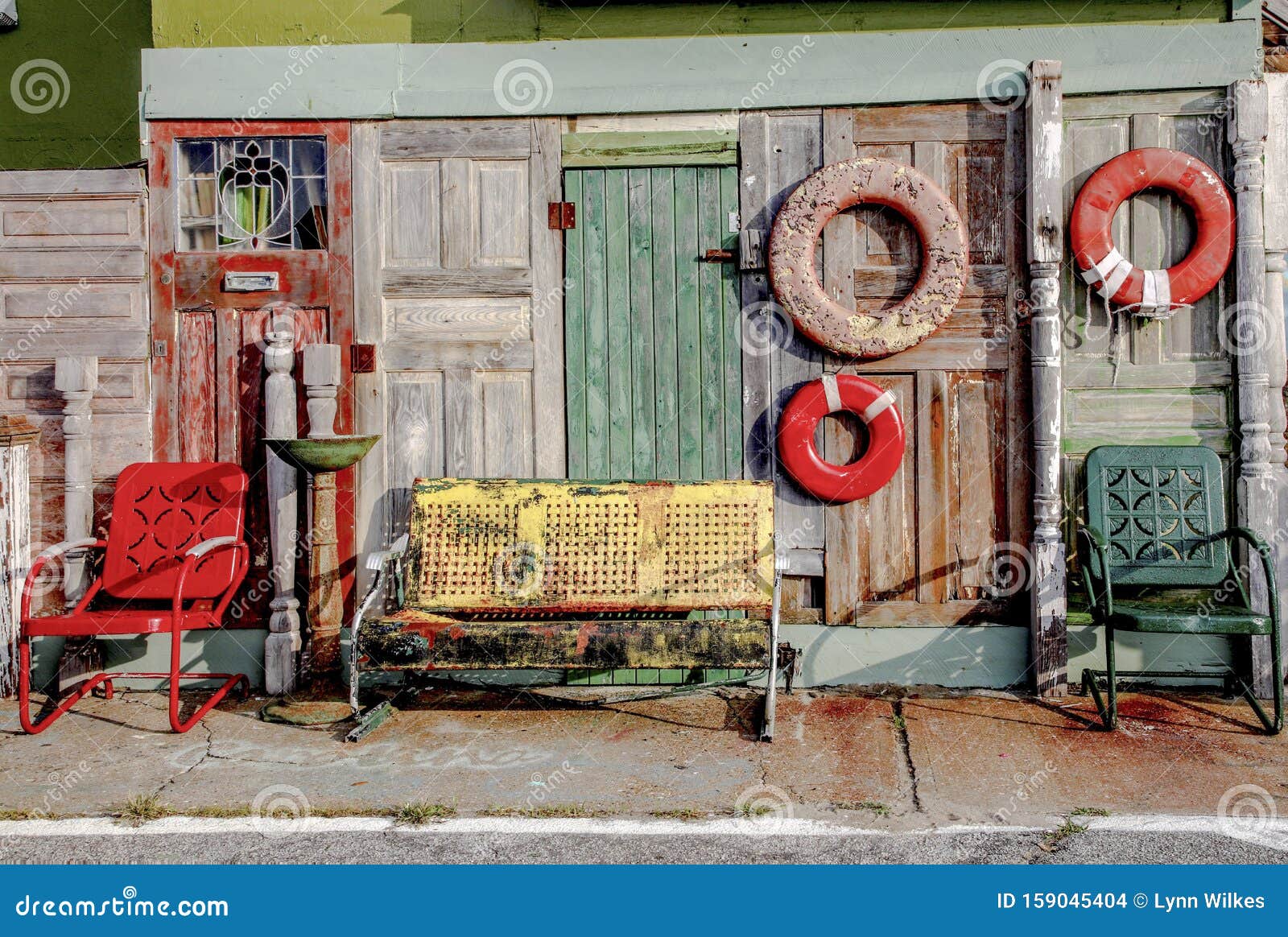 Vintage doors and chairs stock photo. Image of morning 159045404