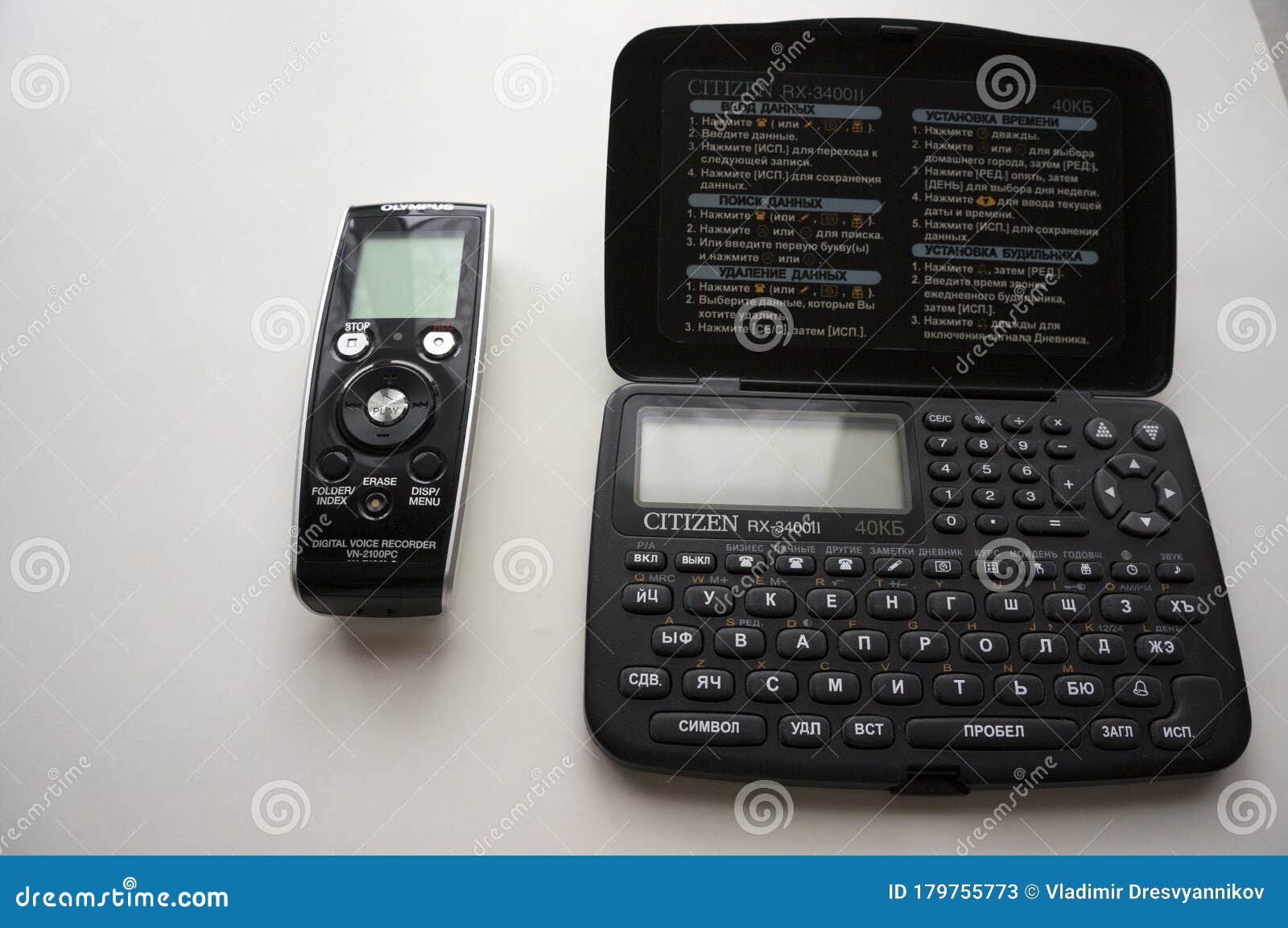 Vintage Electronic Organizer CITIZEN and Voice Recorder OLYMPUS on a White  Background Editorial Stock Photo - Image of deadline, electronic: 179755773