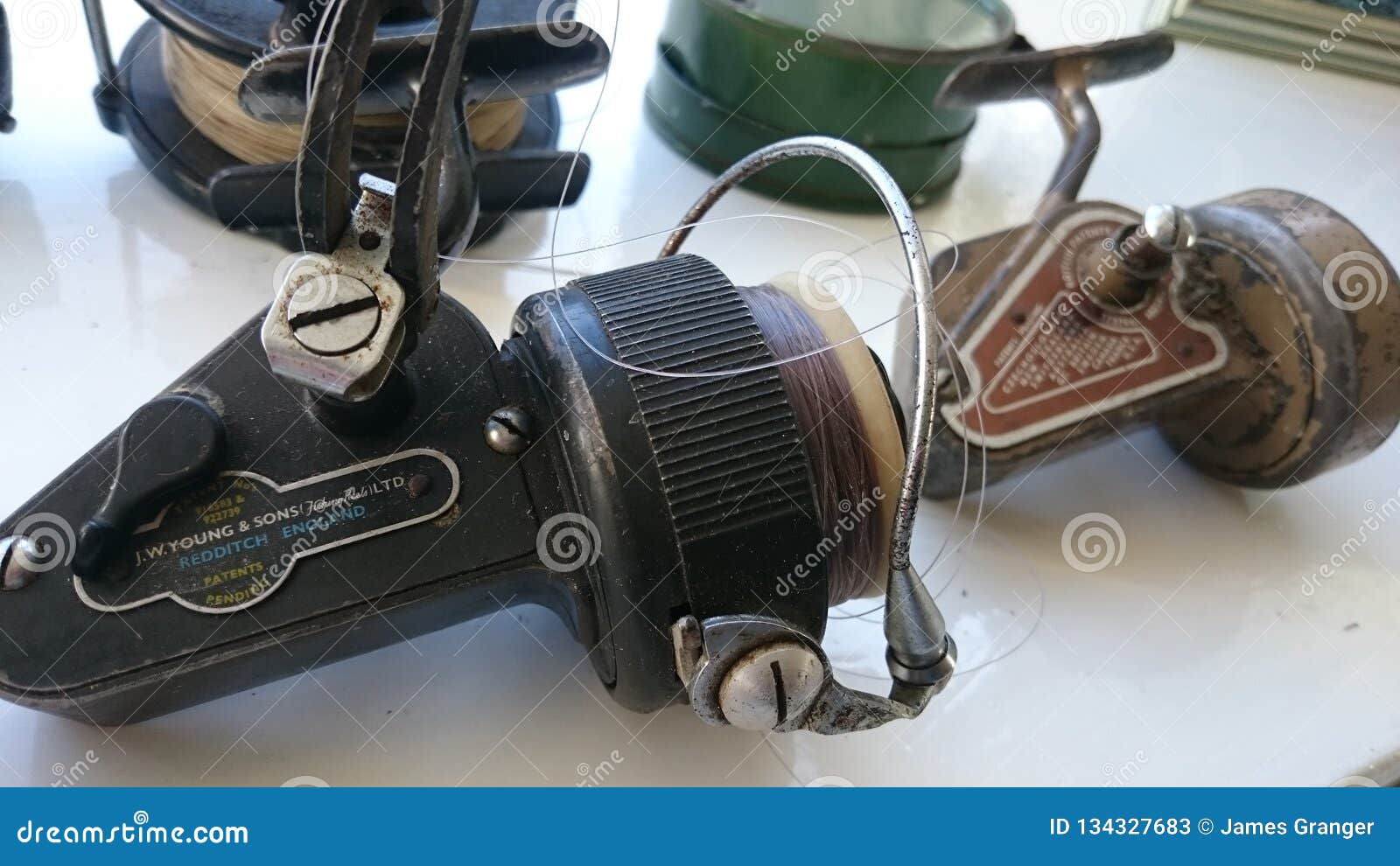 Vintage fishing reels editorial stock photo. Image of reels - 134327683