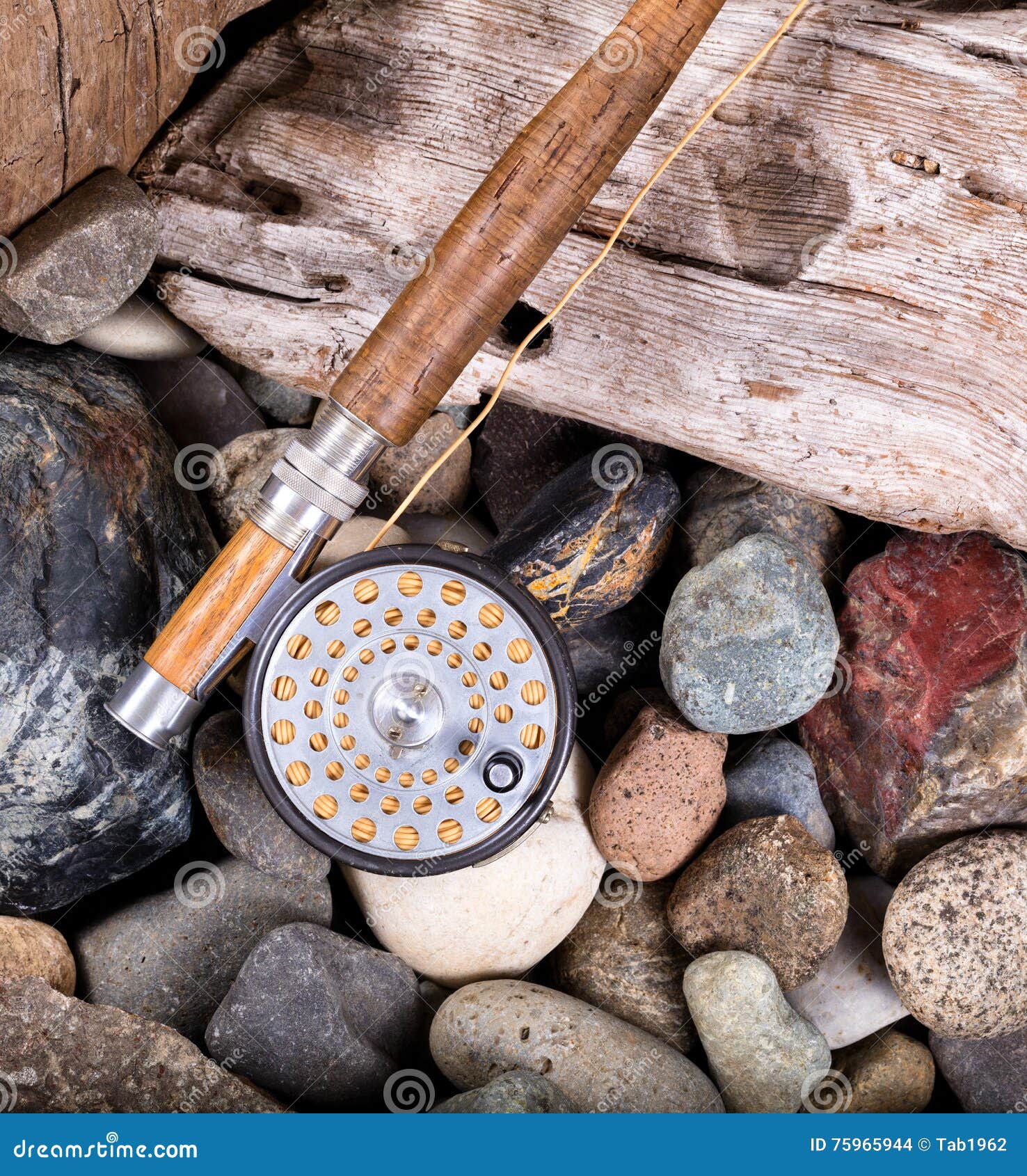 Vintage Fly Fishing Outfit on Rocks and Wood Background Stock Photo - Image  of wood, spool: 75965944