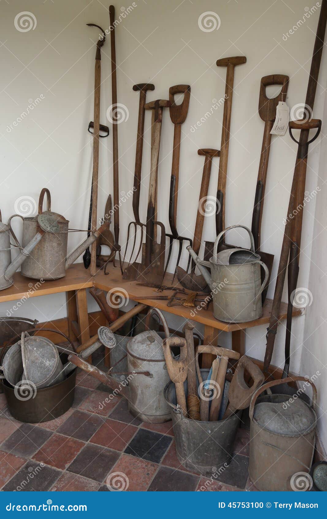 Vintage Garden Tools In White Brick Shed Stock Photo ...