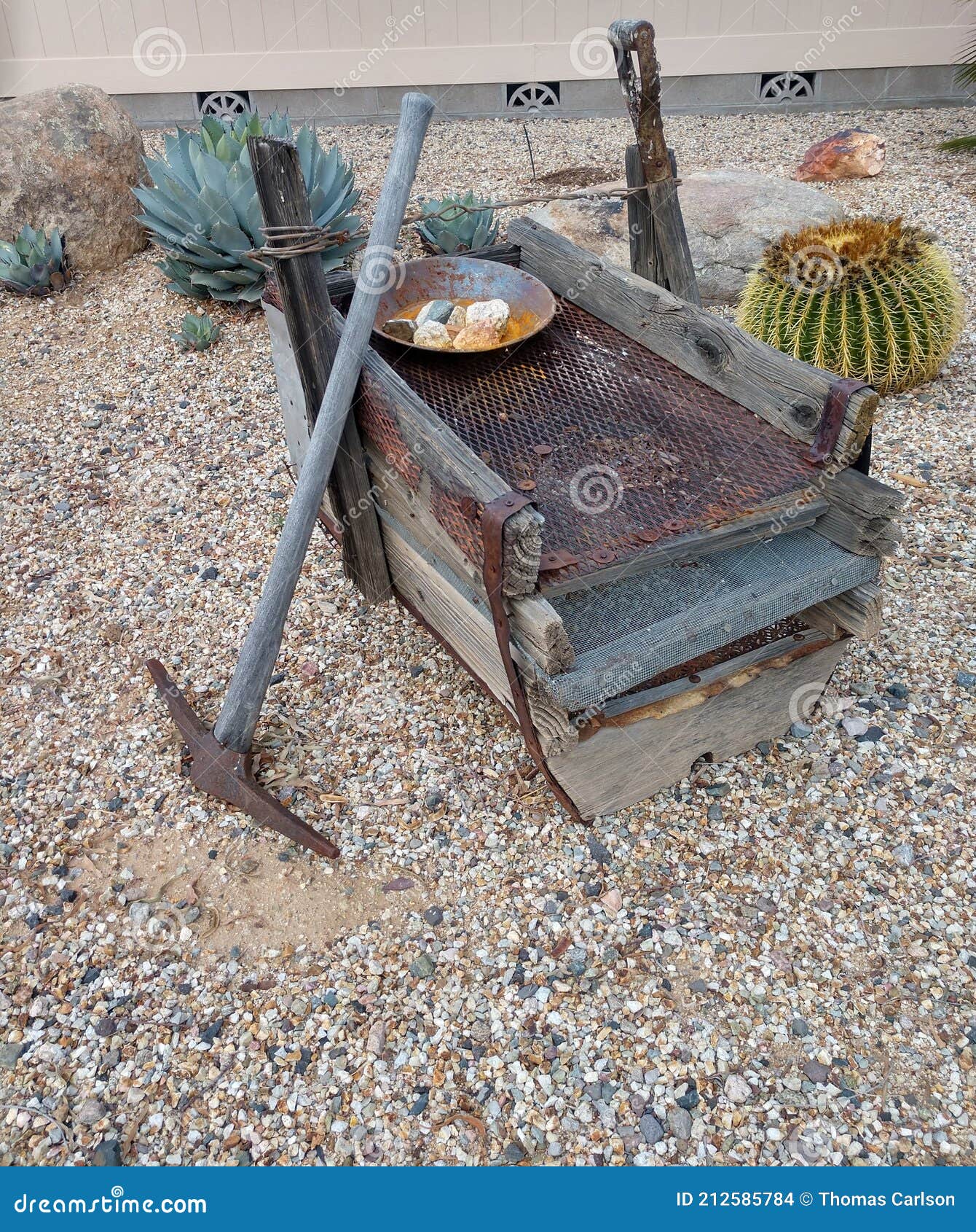 vintage gold prospecting rocker box with gold pan.