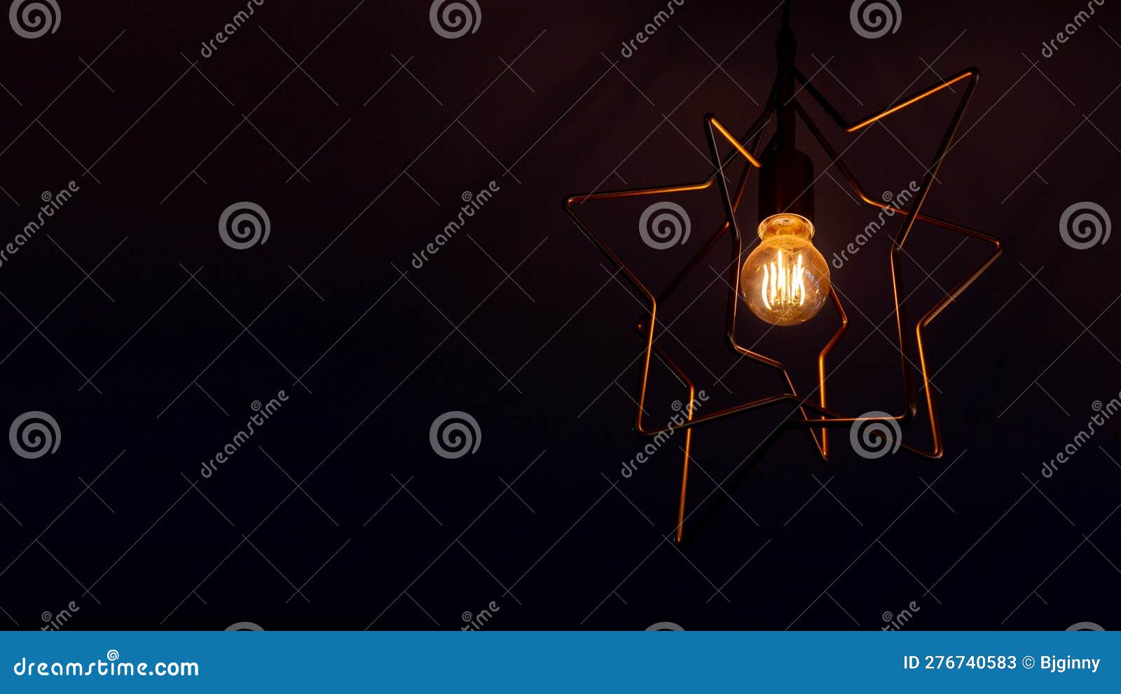 Vintage Incandescent Light Bulb Filament on Black, Close Up Shot Stock ...