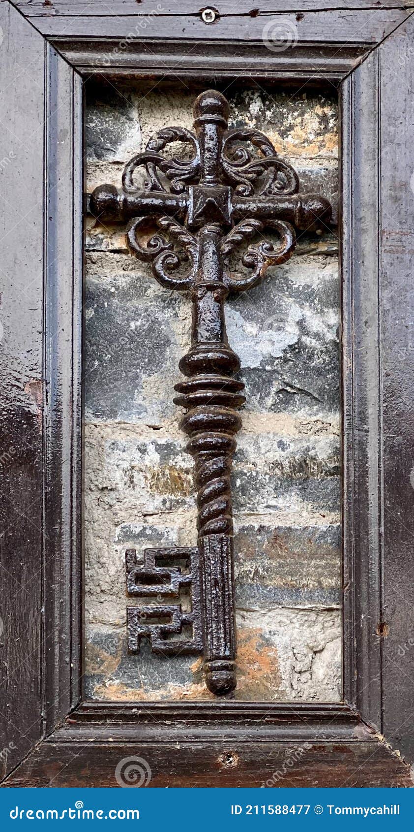 Vintage key on the wall stock image. Image of elegance 211588477