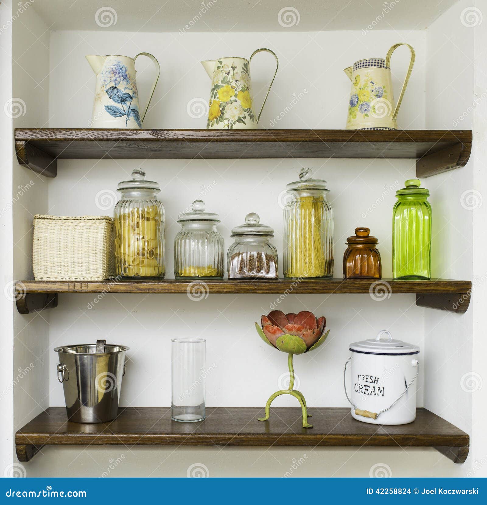 Vintage Kitchen Shelves With Jars, Jugs And Pots Stock 