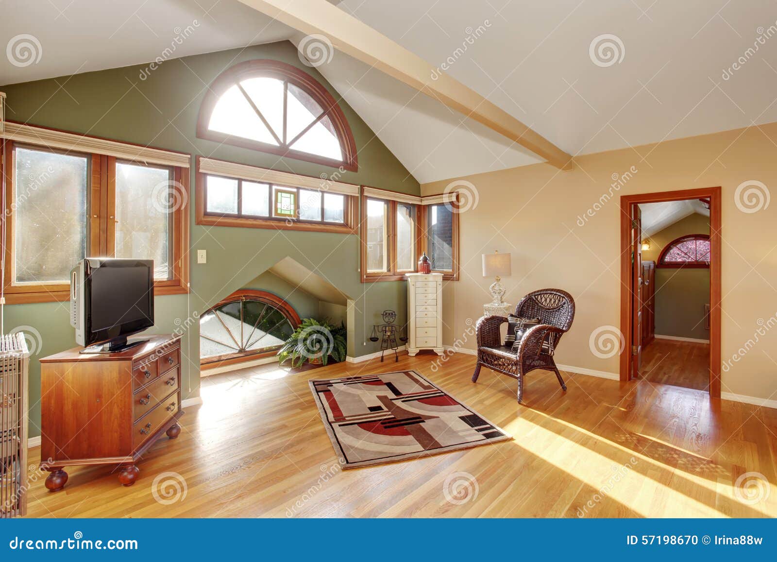 Vintage Loft Style Bedroom With Tv And Hardwood Floor Stock