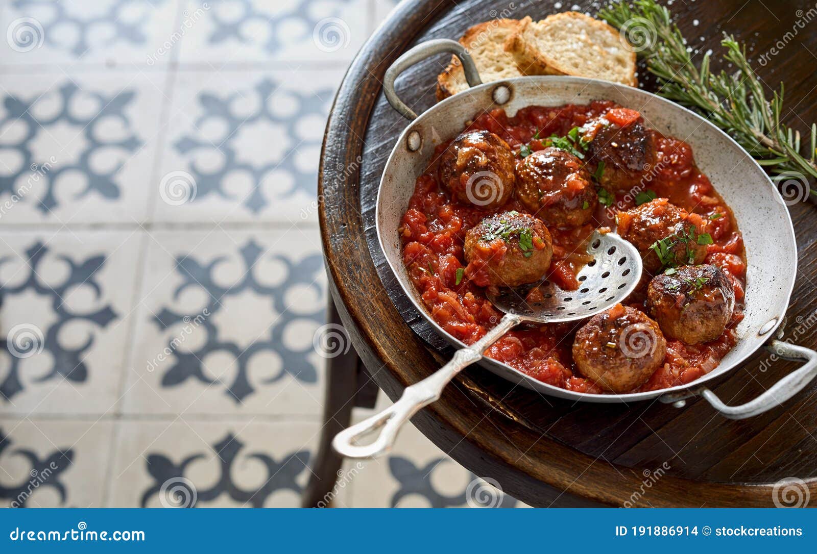 vintage metal dish of spicy spanish meatballs