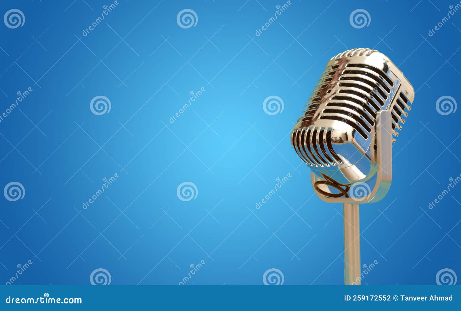 vintage microphone  on blue banner with copy space