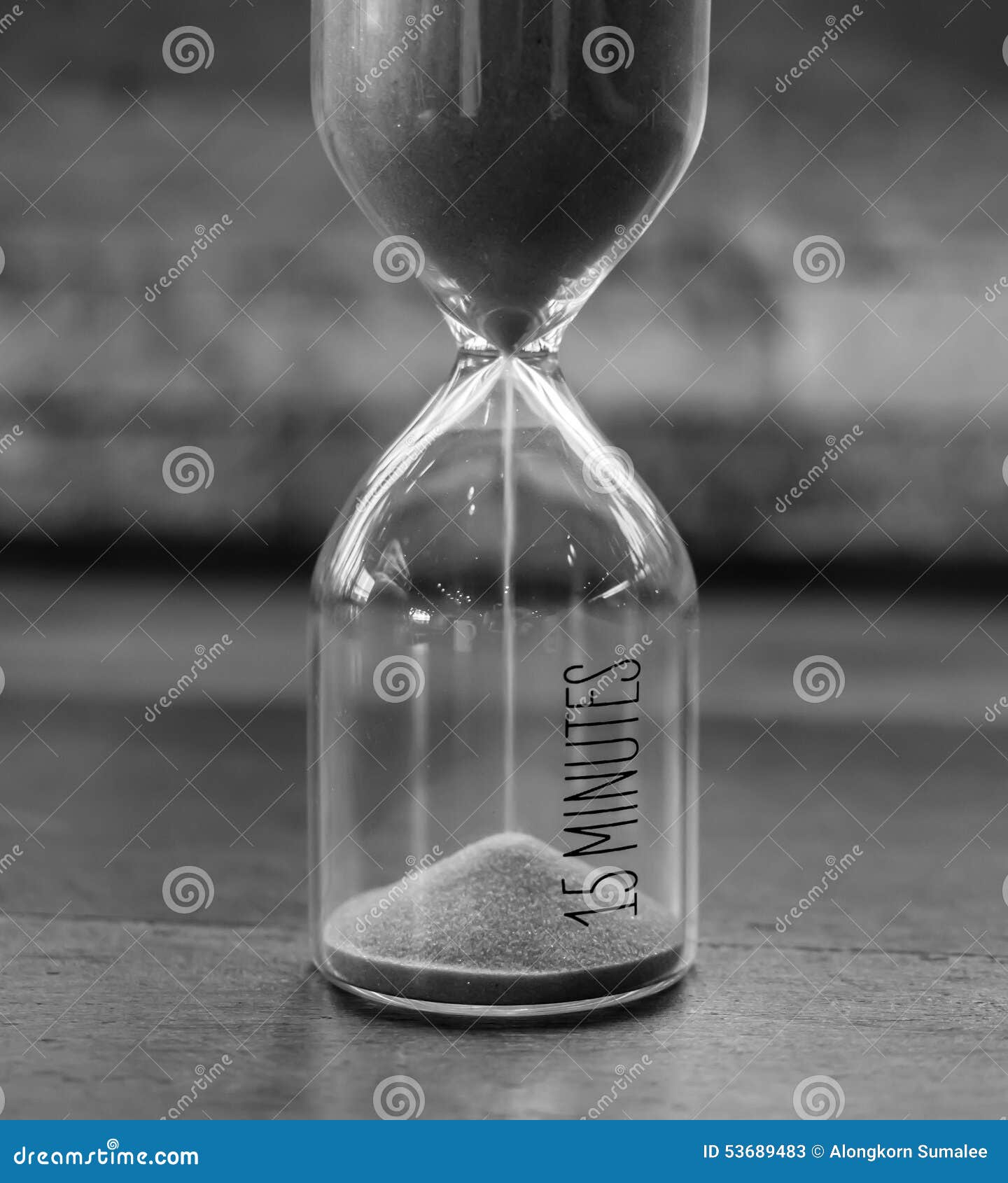 vintage 15 minutes sandglass or hourglass in black and white style