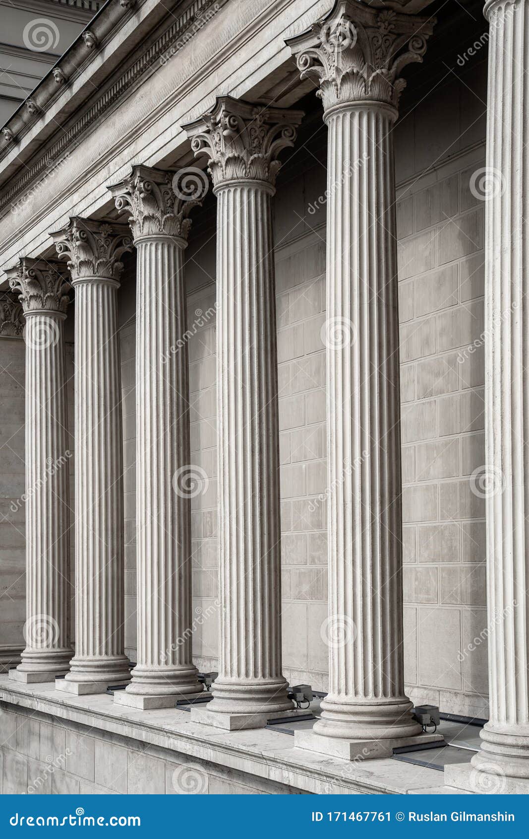 vintage old justice courthouse column. neoclassical colonnade with corinthian columns as part of a public building