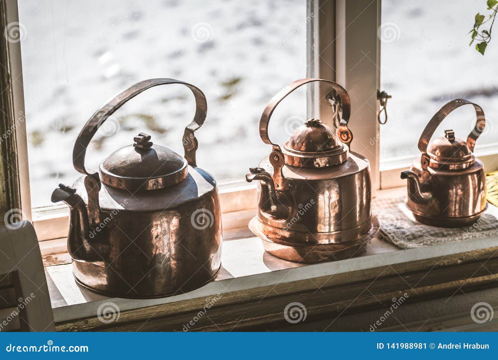Vintage Old Style Metal Kettle On The Window Sill Stock