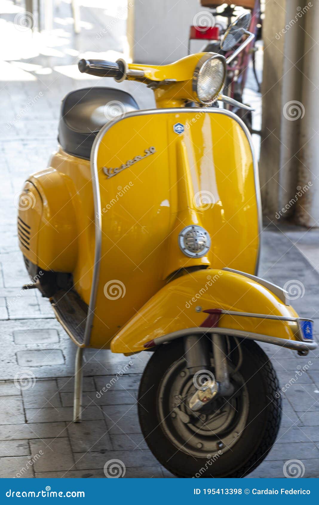 Piaggio Vespa in Yellow Color Editorial Stock Photo - Image of bike: