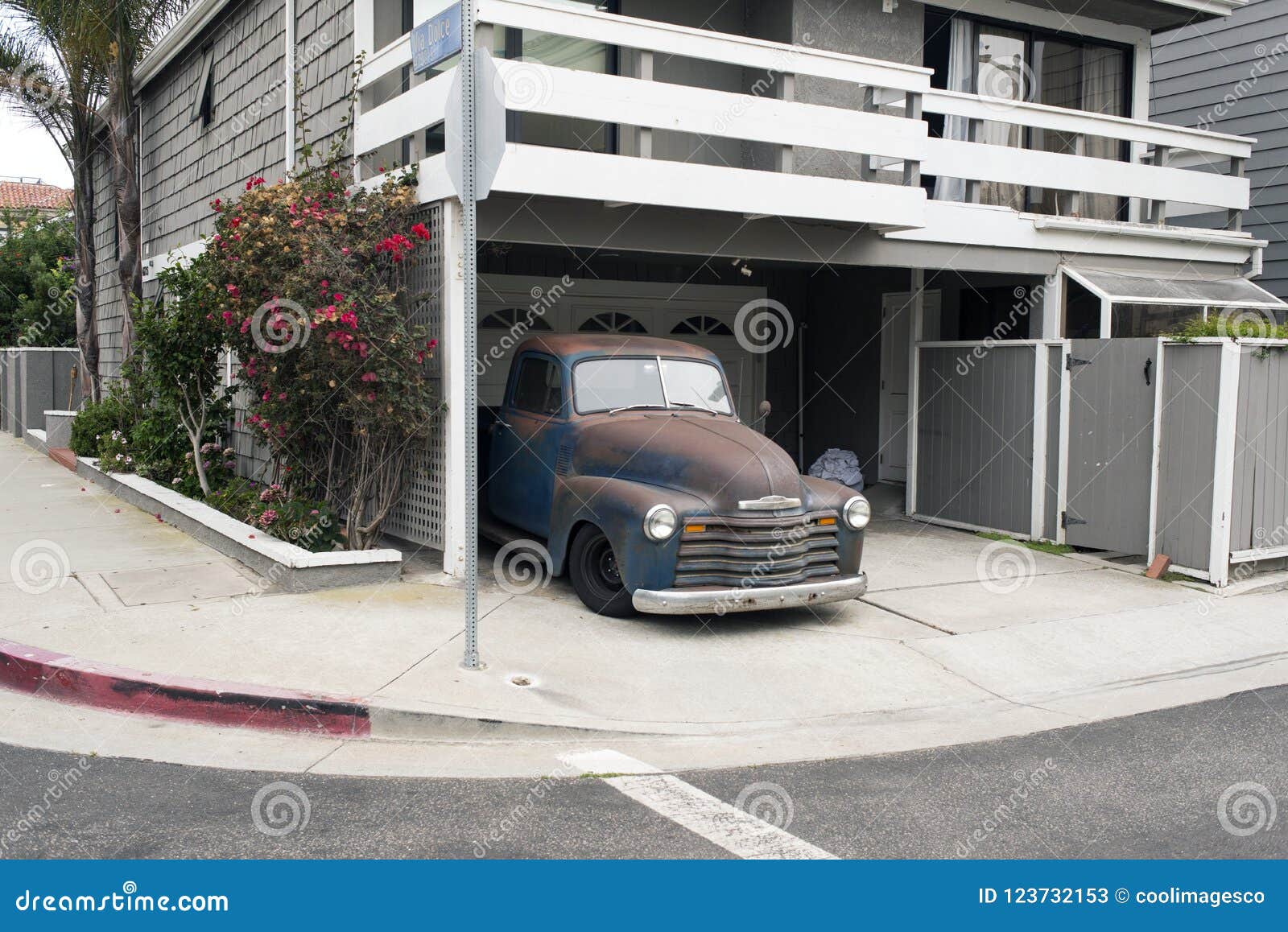 a vintage pick up car in the street in venice, california