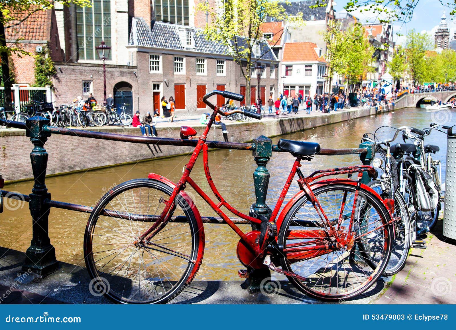 Vintage Red Bicycle Near a Canal in Amsterdam Stock Image - Image of ...