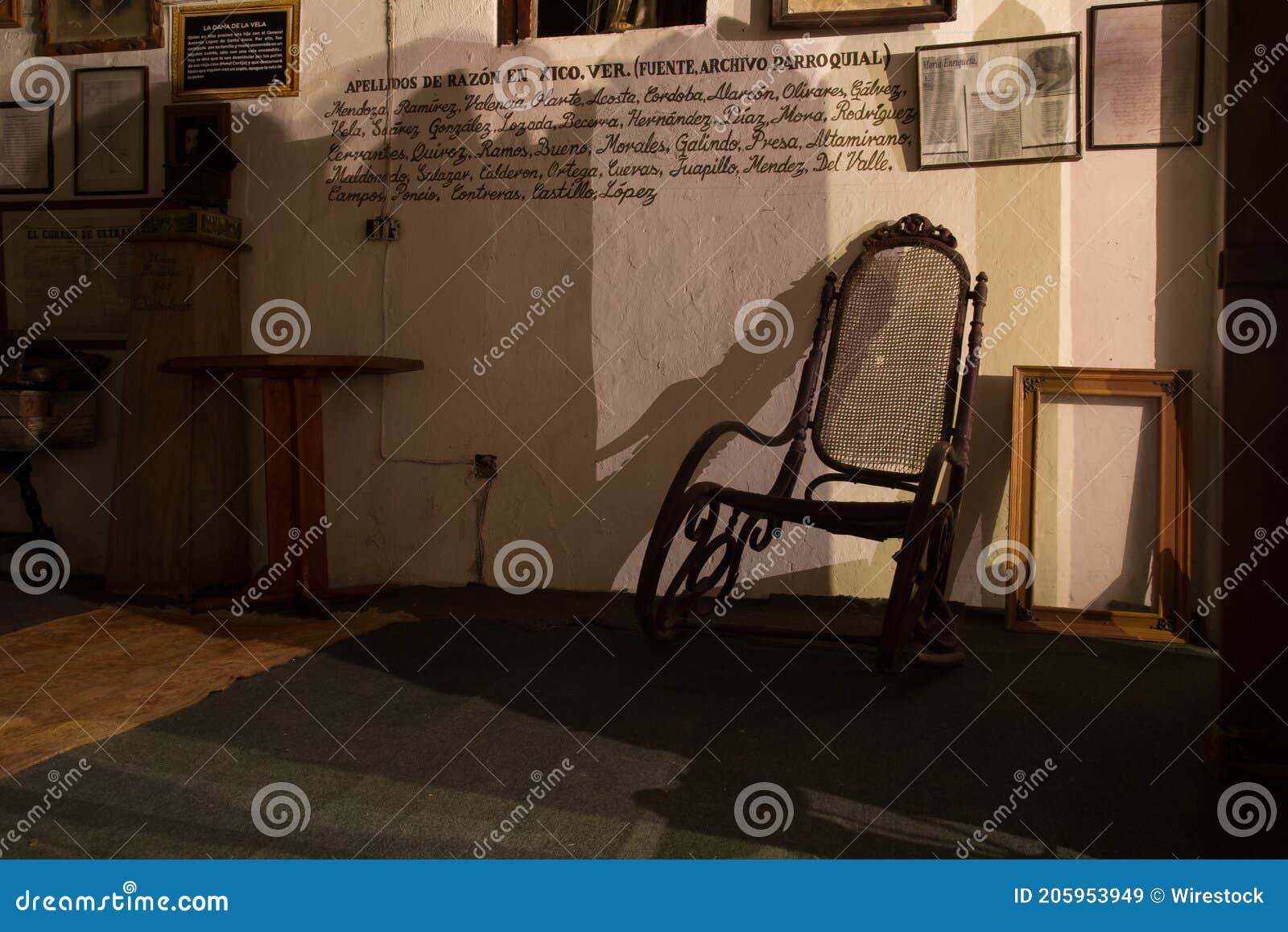 vintage rocking chair against a wall in xico, veracruz, mexico