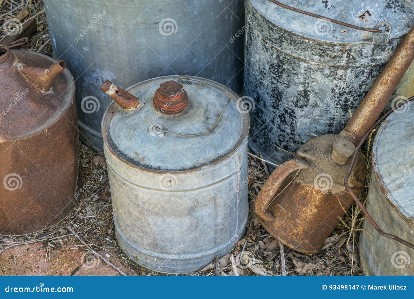 Vintage rusty oil cans stock image. Image of metal, oilcan 93498147