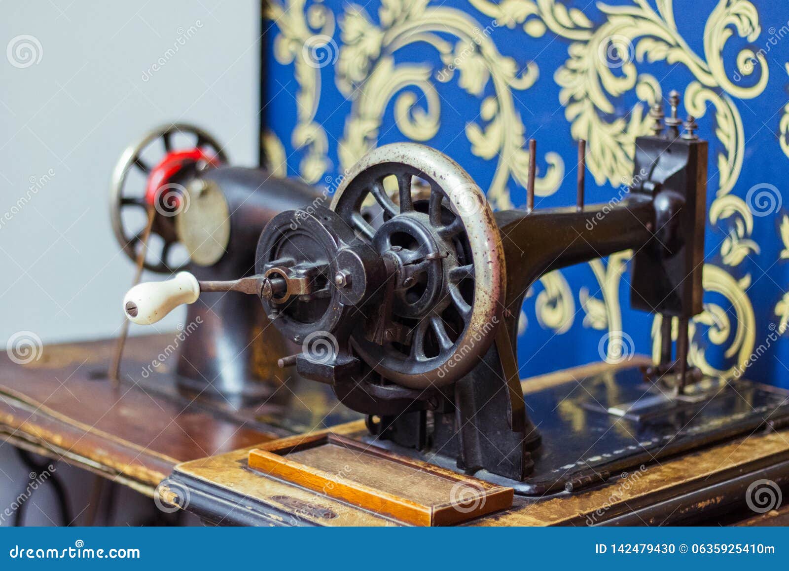 Vintage sewing machine editorial image. Image of industry 142479430