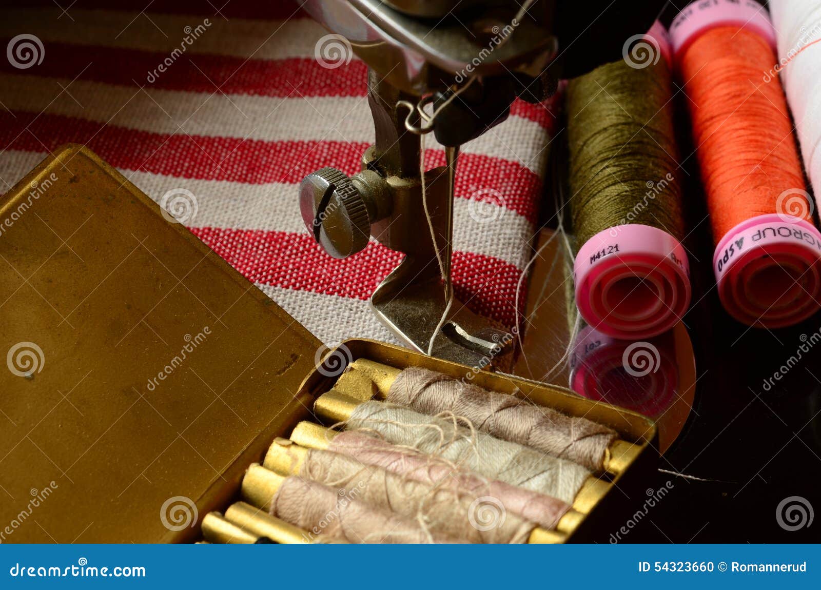 Vintage Sewing Machine and Set of Thread Spools Stock Photo Image of