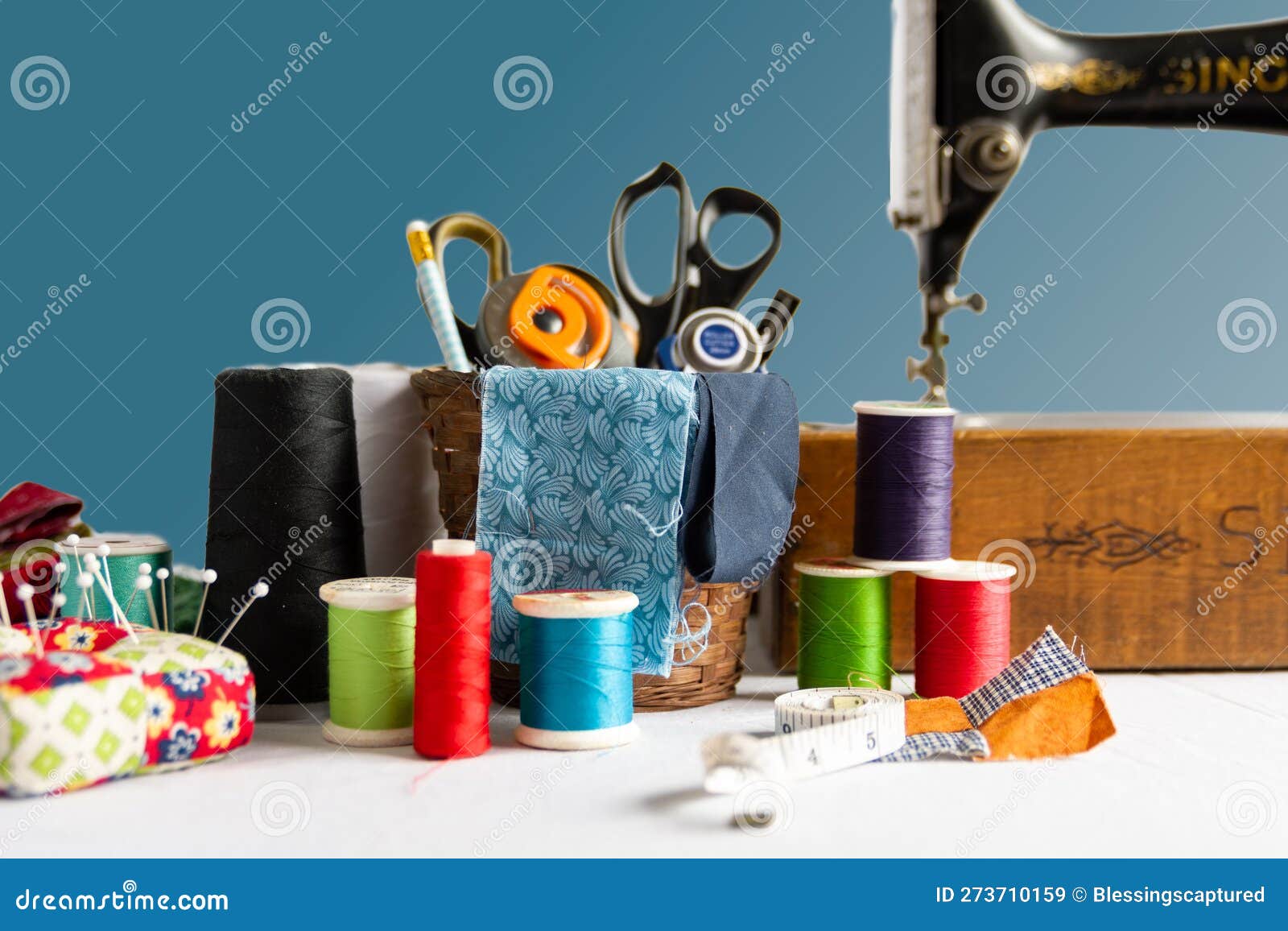 A Vintage Sewing Machine with Sewing Supplies Stock Image Image of gold, blue 273710159