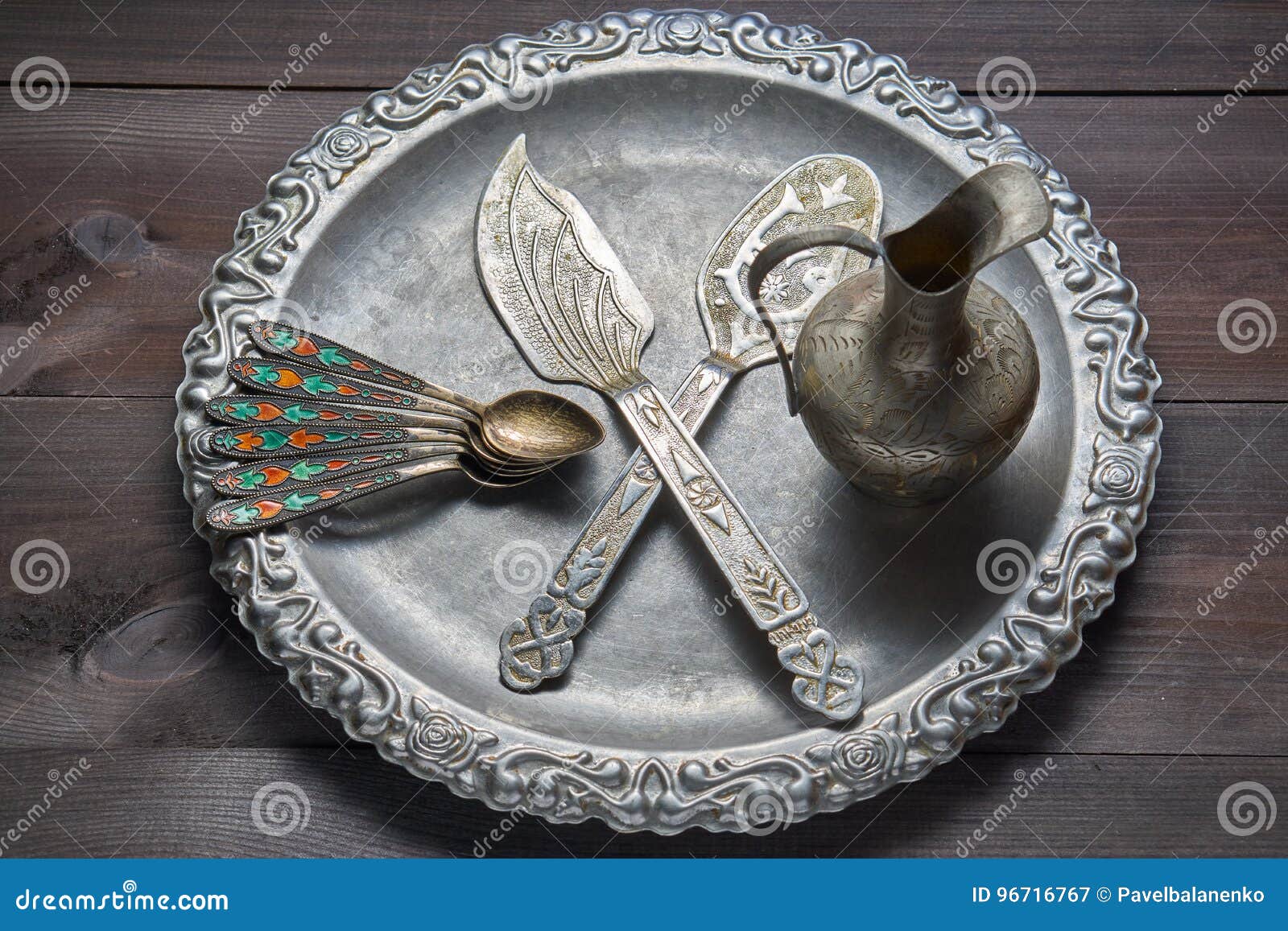 Vintage Silver Kitchen Utensil with Ornaments on Silver Tray Stock