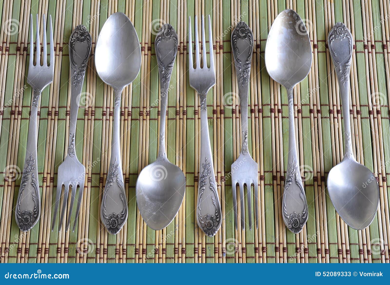 Vintage Spoons and Forks on Bamboo Napkin Stock Image Image of forks